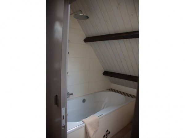 …met bad en rain shower.